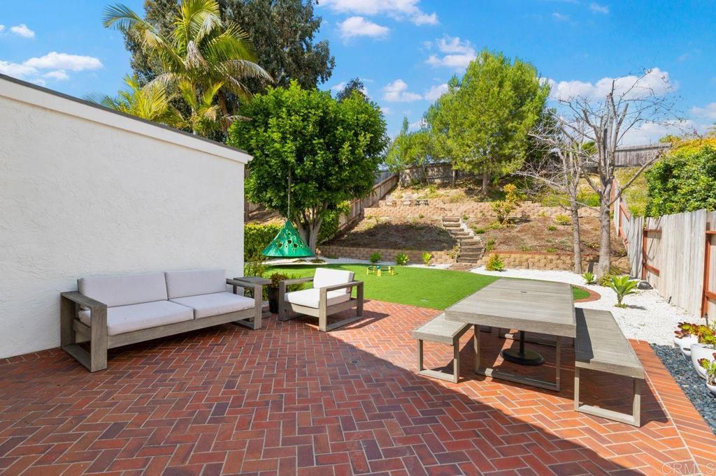 1736 Hill Top Lane Encinitas, CA 92024 - Photo 16 of 41 a view of a patio with couple of chairs in a patio