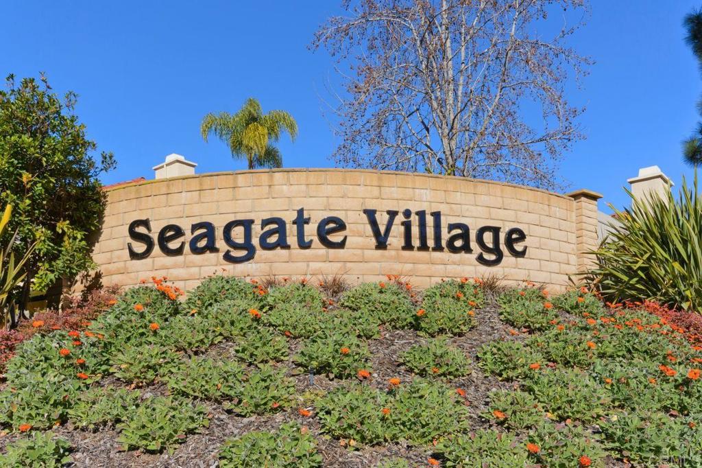 1736 Hill Top Lane Encinitas, CA 92024 - Photo 33 of 41 a sign of golf club on a wall under a tree