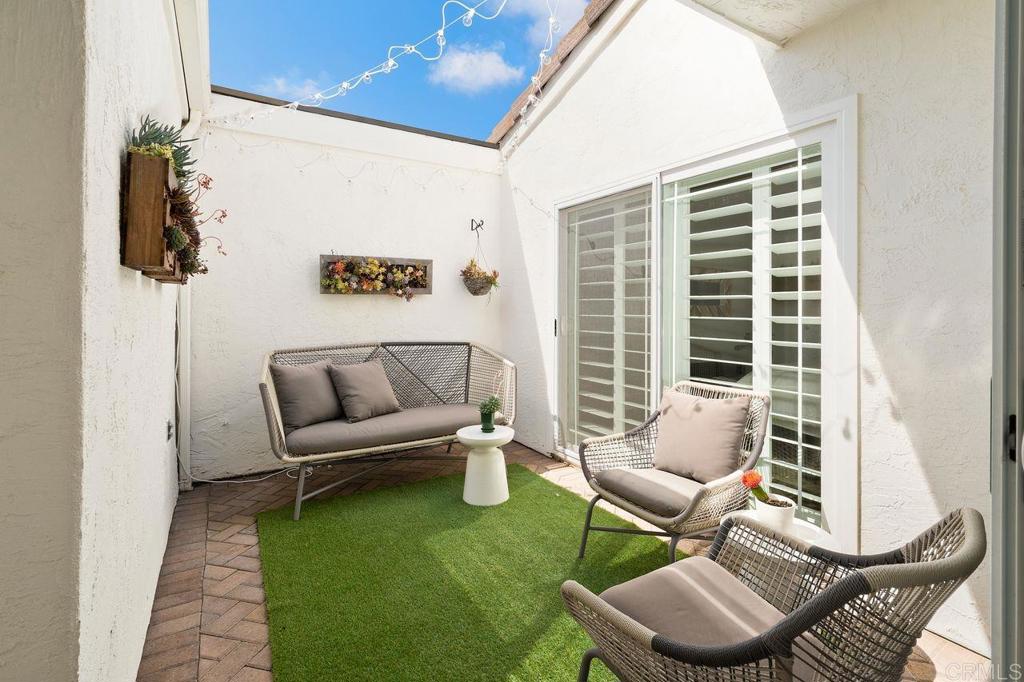 1736 Hill Top Lane Encinitas, CA 92024 - Photo 7 of 41 a living room with furniture and a rug