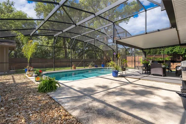 a view of yard with a patio