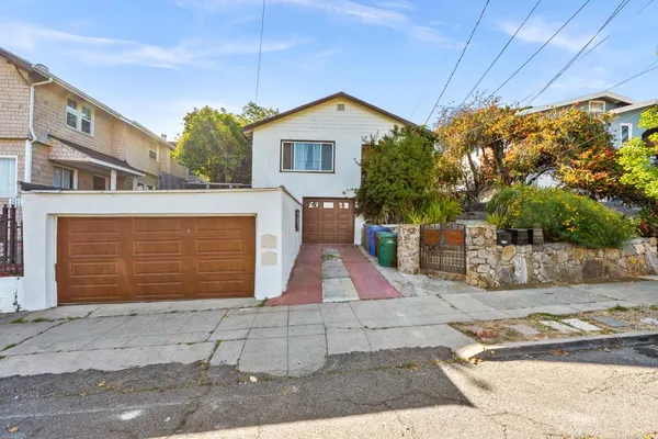 a front view of house with garage