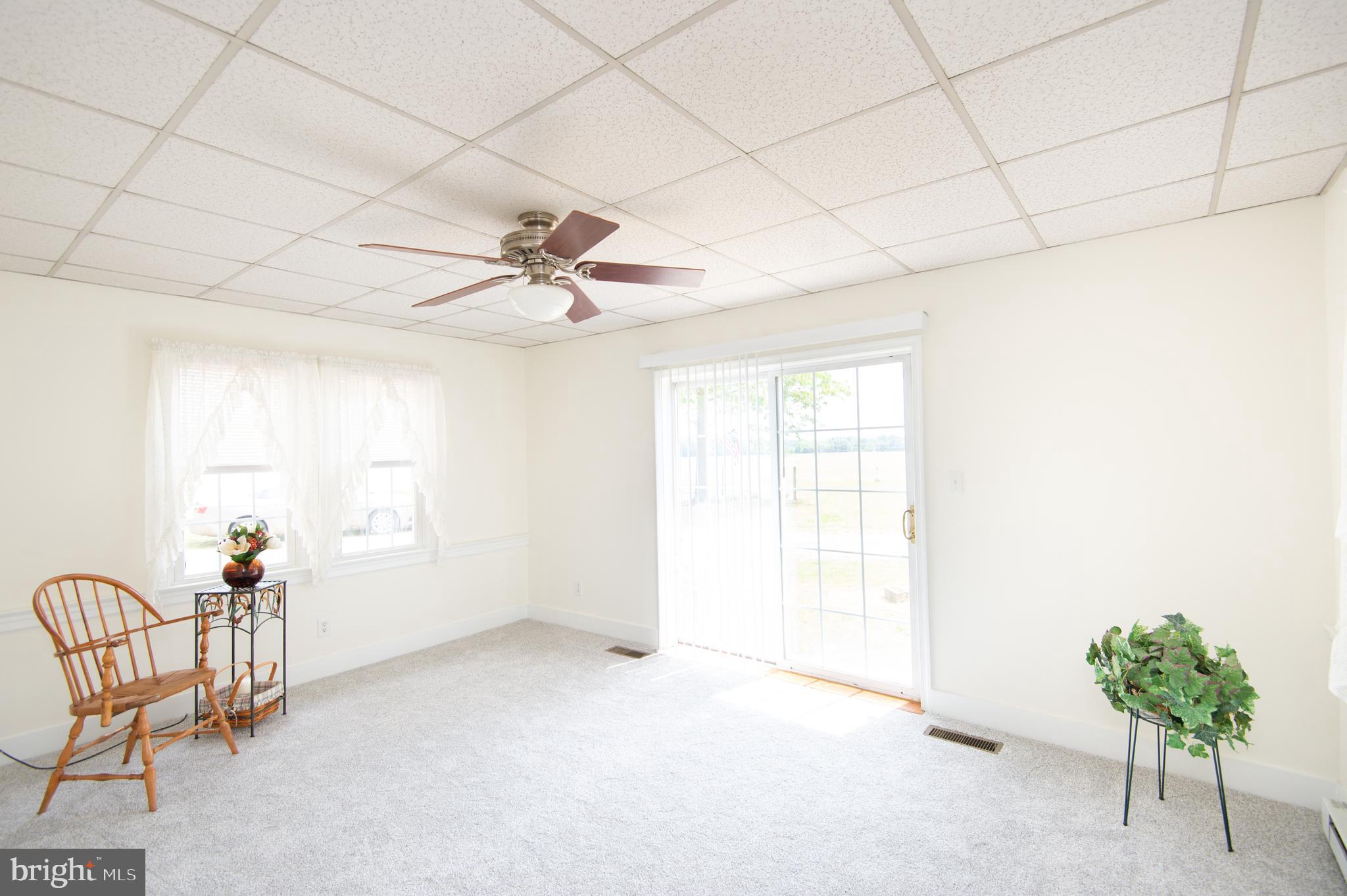 6100 Galestown-Delaware Line Road Rhodesdale, MD 21659 - Photo 4 of 41 sunroom