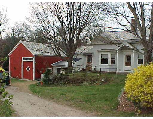 11 Fomer Road Southampton, MA 01073 - Photo 1 of 1 a front view of house with yard and green space