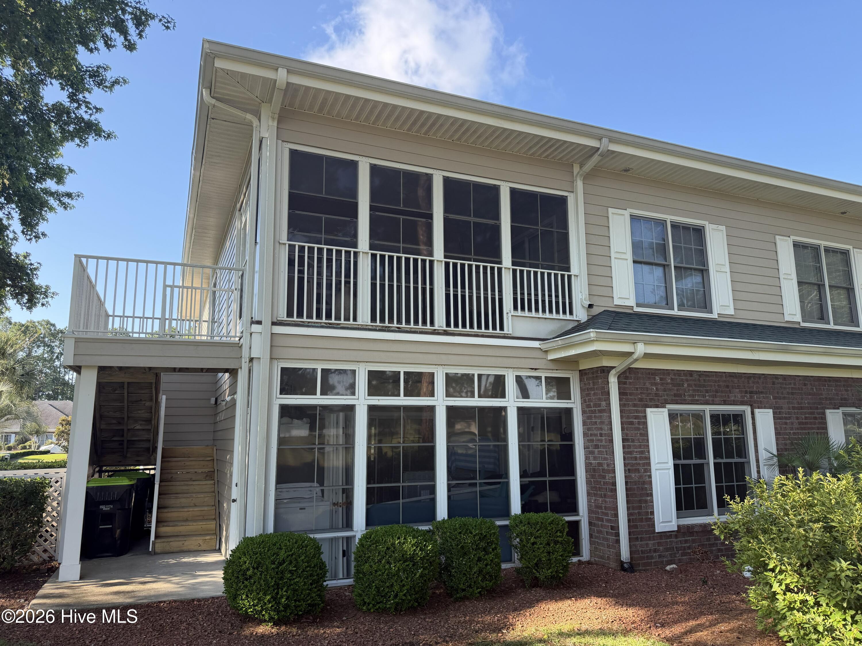 116 Rice Mill Circle, Unit 4 Sunset Beach, NC 28468 - Photo 5 of 29 Back of condo.