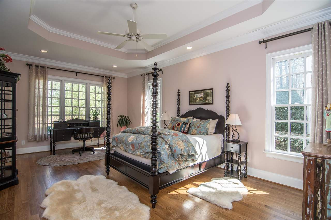 3310 Westover Road Durham, NC 27707 - Photo 12 of 30 a spacious bedroom with a bed and a window