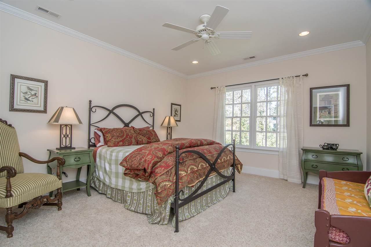 3310 Westover Road Durham, NC 27707 - Photo 17 of 30 a bedroom with a bed a table and chair