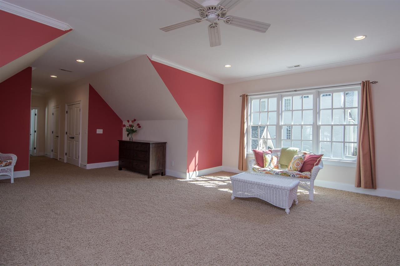 3310 Westover Road Durham, NC 27707 - Photo 23 of 30 a living room with furniture and a fireplace