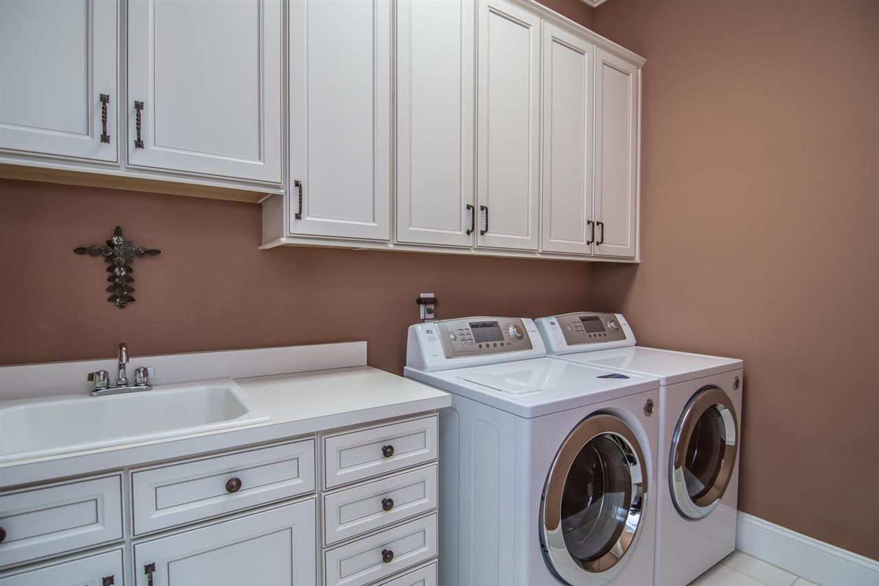 3310 Westover Road Durham, NC 27707 - Photo 25 of 30 a utility room with dryer and washer