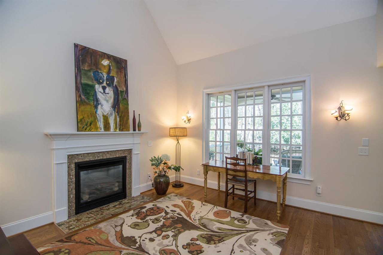 3310 Westover Road Durham, NC 27707 - Photo 10 of 30 a living room with furniture and a fireplace