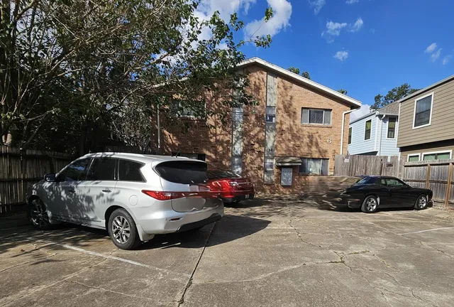 a view of a car in front of house