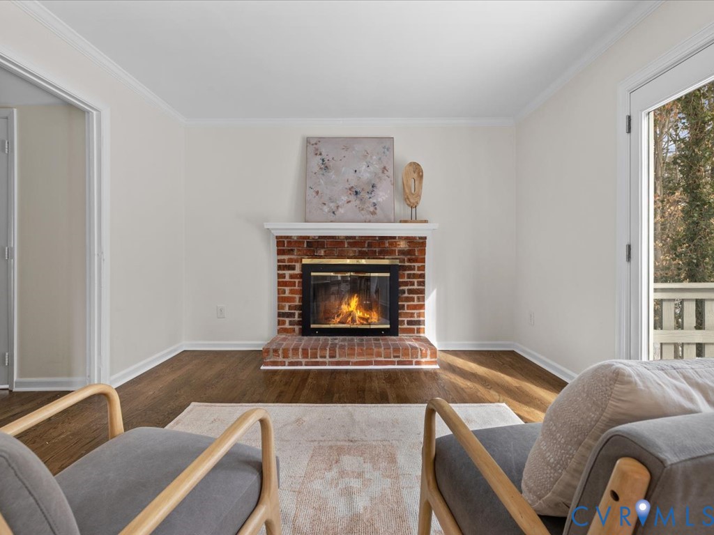 13217 Court Ridge Road Midlothian, VA 23112 - Photo 12 of 37 a living room with furniture and a fireplace