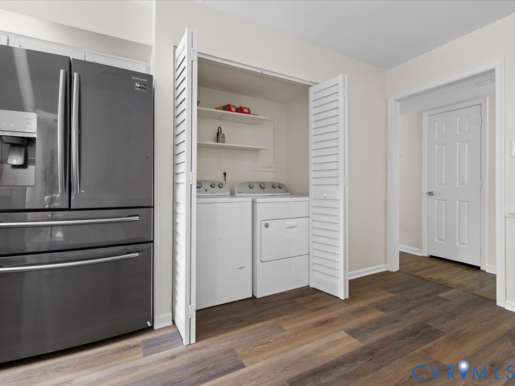 13217 Court Ridge Road Midlothian, VA 23112 - Photo 24 of 37 a kitchen with white cabinets and stainless steel appliances