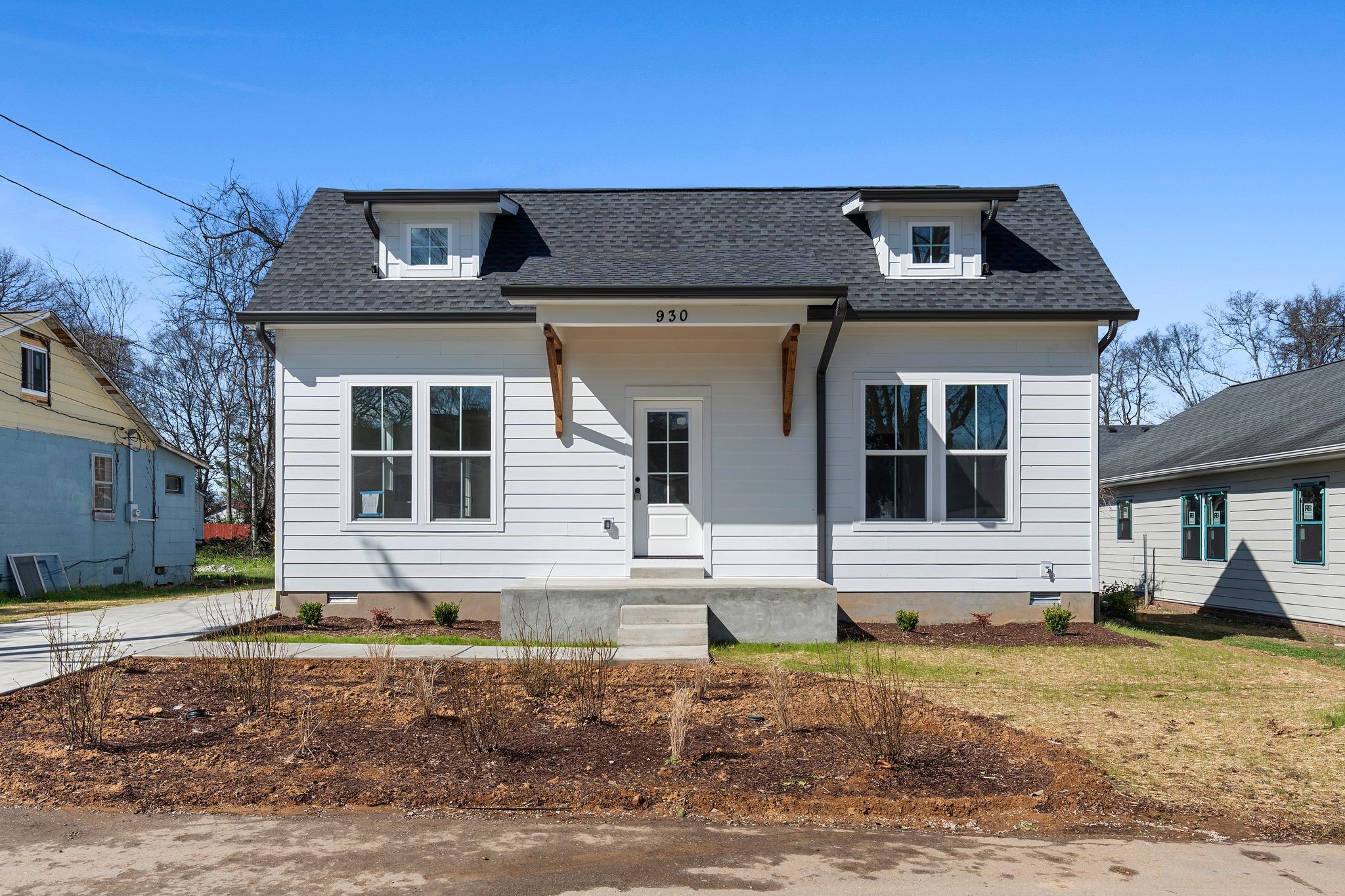 930 Glass Street Franklin, TN 37064 - Photo 1 of 34 a front view of a house with garden