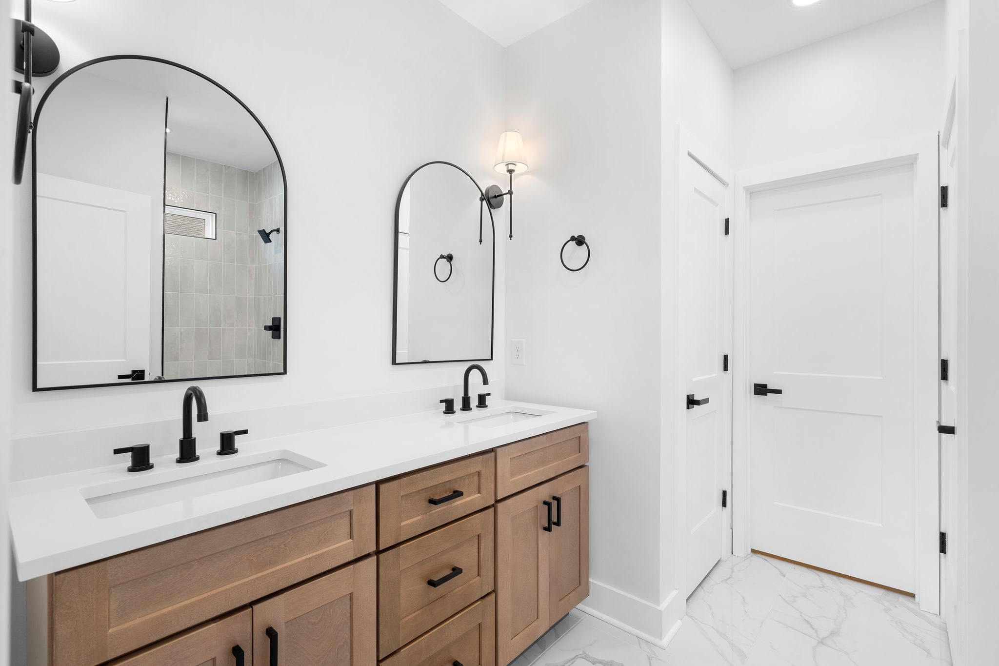 930 Glass Street Franklin, TN 37064 - Photo 13 of 34 a bathroom with a double vanity sink and mirror