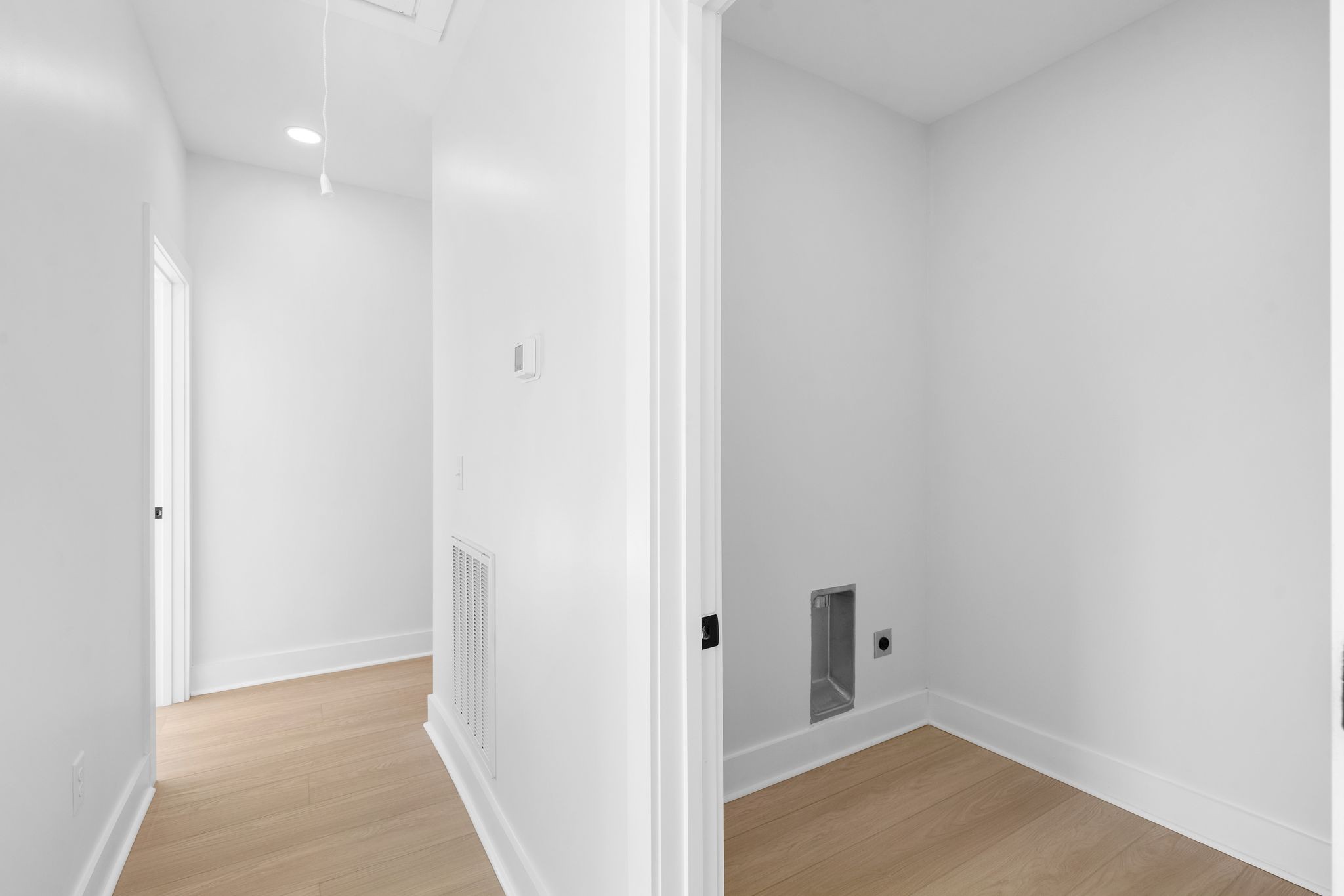 930 Glass Street Franklin, TN 37064 - Photo 18 of 34 a view of a hallway with wooden floor