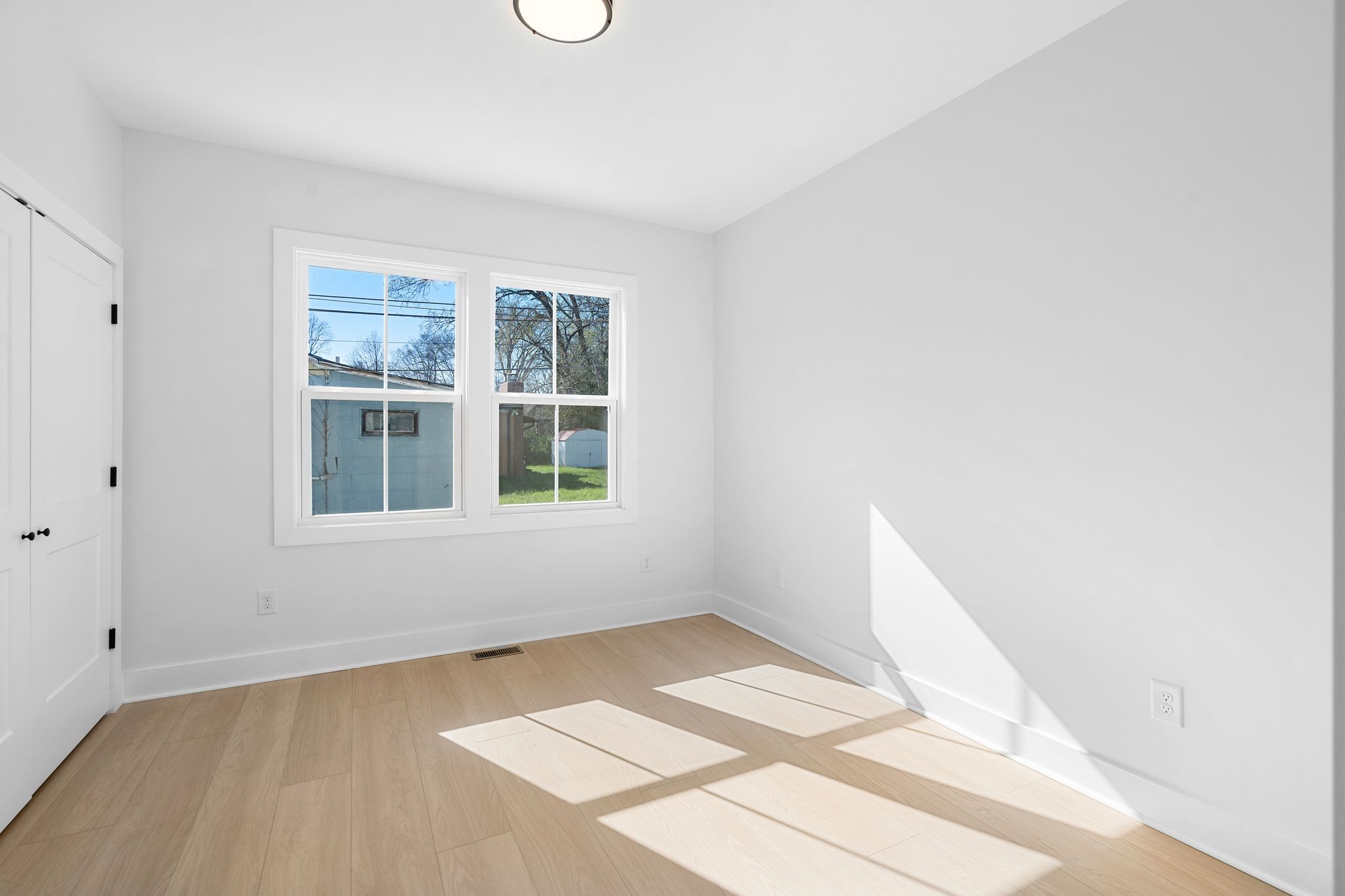 930 Glass Street Franklin, TN 37064 - Photo 19 of 34 a view of an empty room with a window