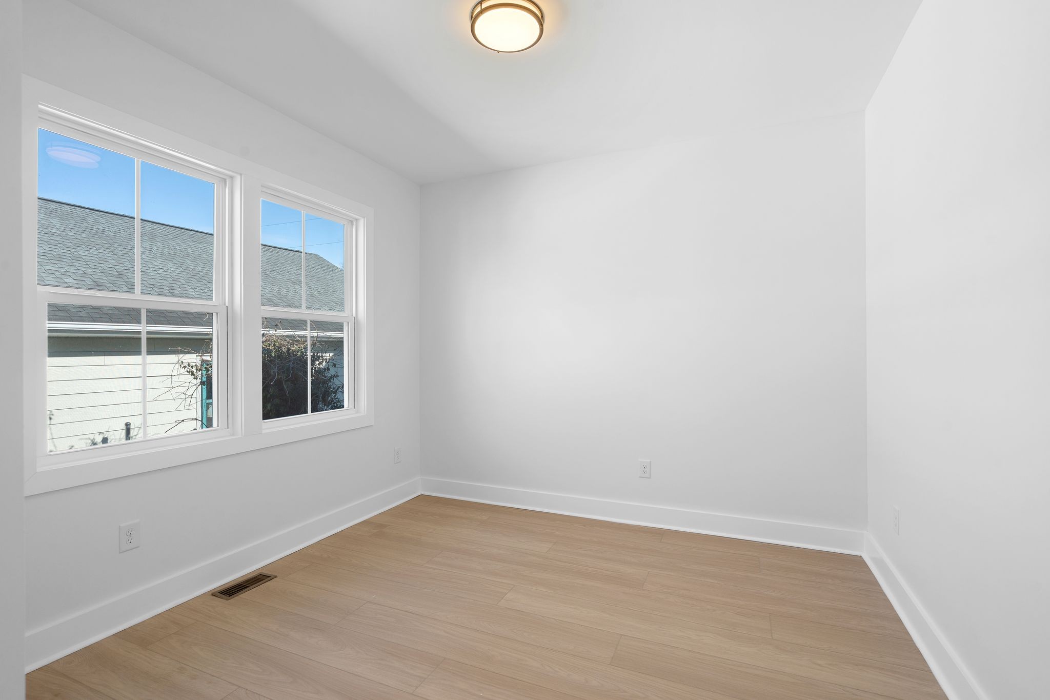 930 Glass Street Franklin, TN 37064 - Photo 26 of 34 a view of empty room with wooden floor and fan