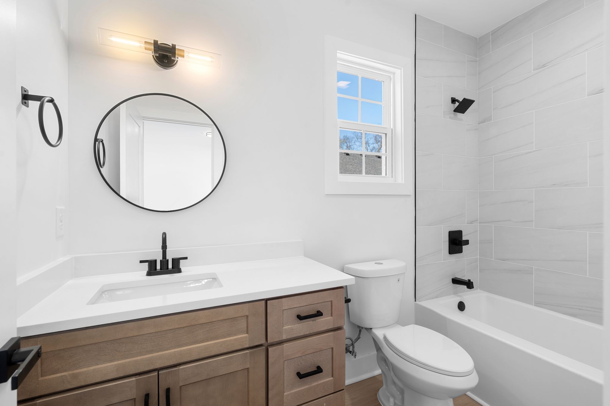 930 Glass Street Franklin, TN 37064 - Photo 28 of 34 a bathroom with a sink a toilet and a mirror