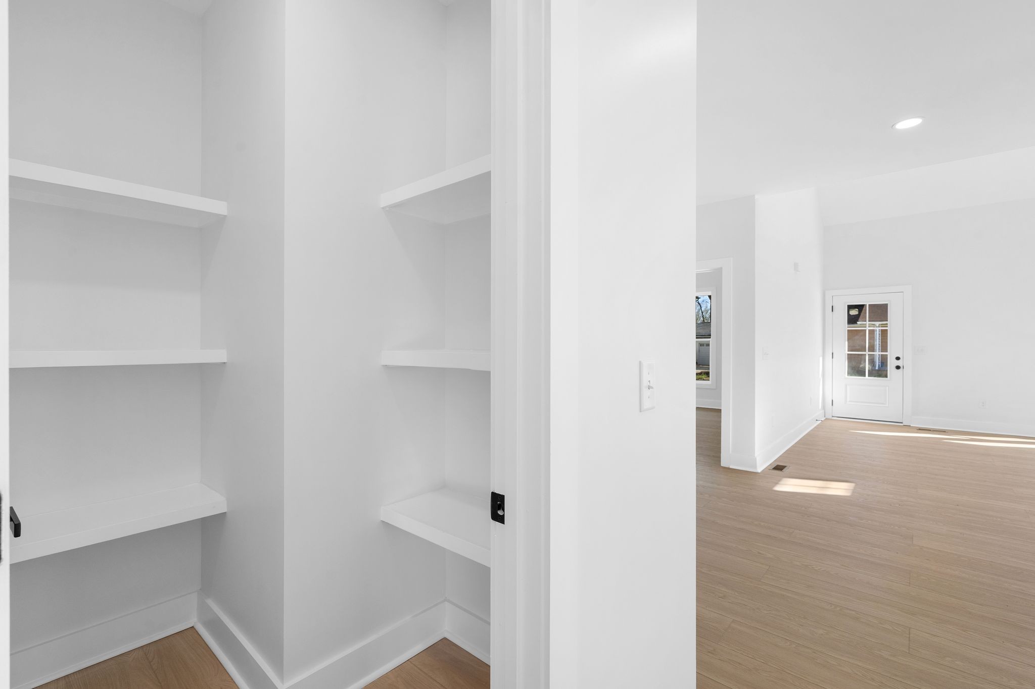 930 Glass Street Franklin, TN 37064 - Photo 5 of 34 a view of a hallway with wooden floor