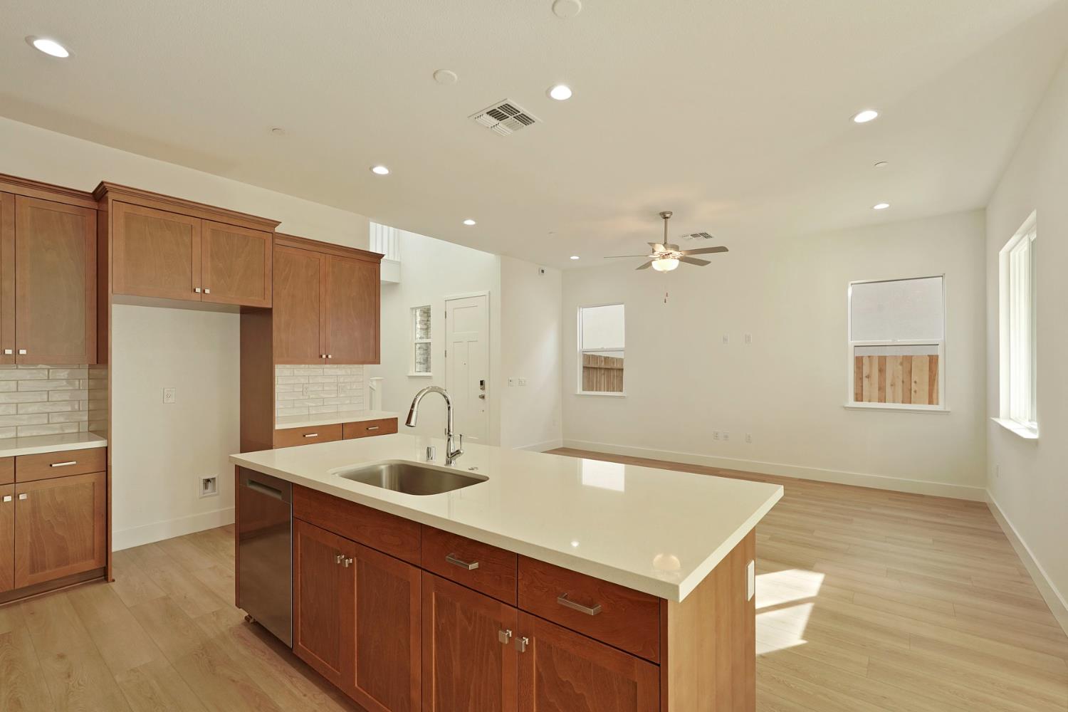 446 Tigris Street Manteca, CA 95337 - Photo 11 of 46 Large kitchen island overlooking great room