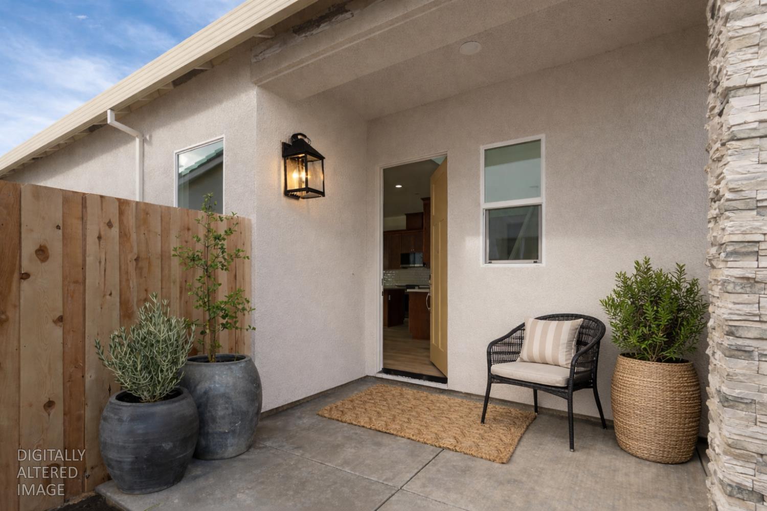 446 Tigris Street Manteca, CA 95337 - Photo 2 of 46 Side entry front door (virtually staged)
