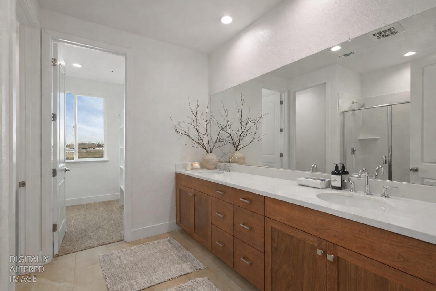 446 Tigris Street Manteca, CA 95337 - Photo 35 of 46 Upstairs primary suite bath (virtually staged)