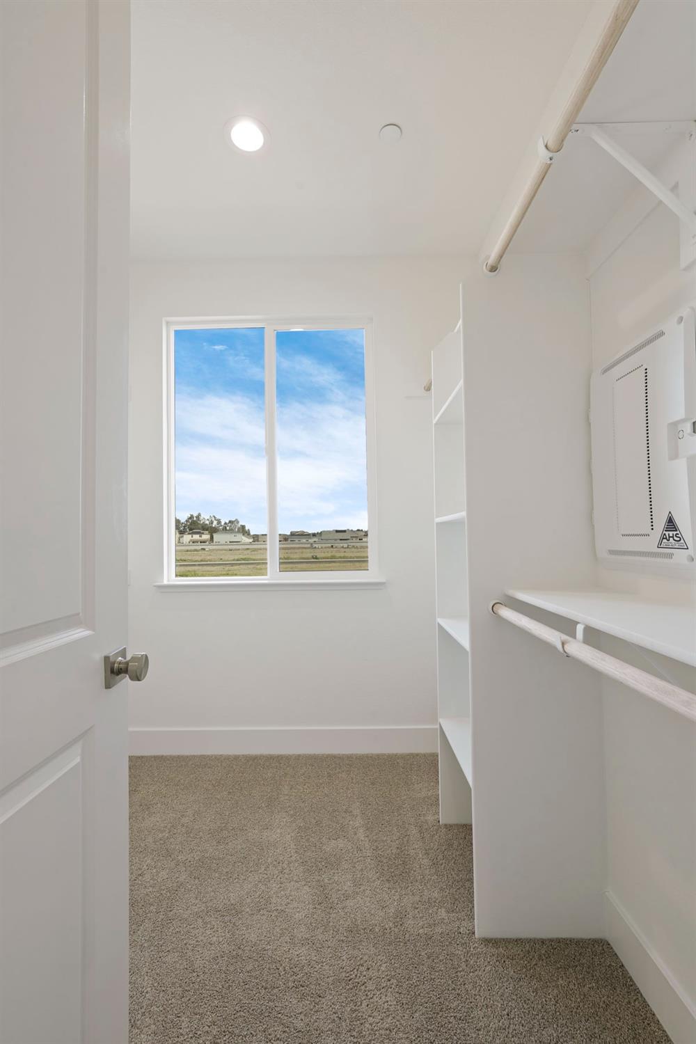 446 Tigris Street Manteca, CA 95337 - Photo 37 of 46 Upstairs primary walk-in closet