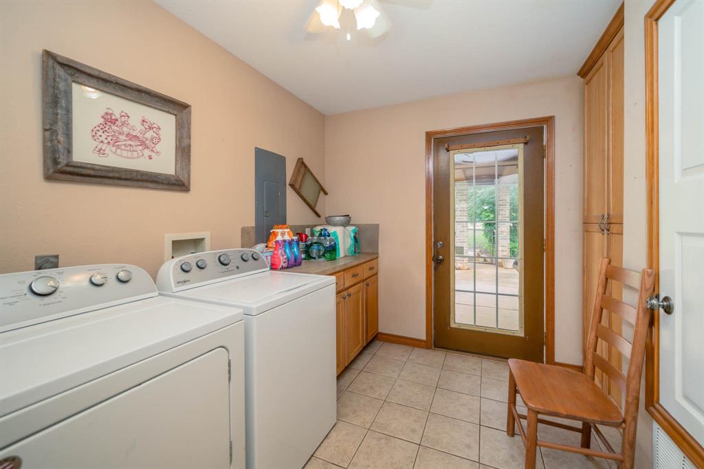 14266 Timberidge Lane Winona, TX 75792 - Photo 19 of 33 a utility room with dryer and washer