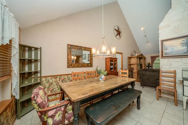 a room with pool table and flat screen tv