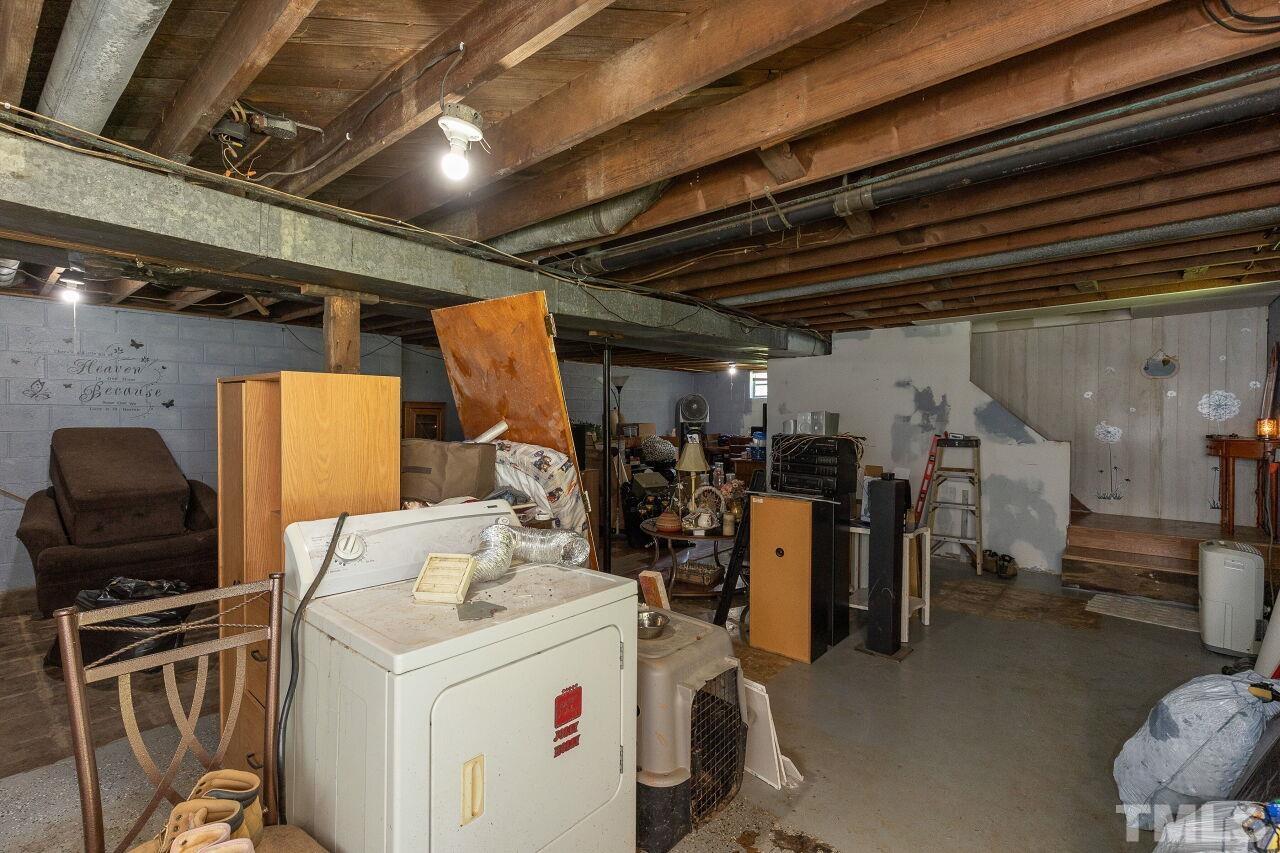 680 Haywood Bailey Road Roxboro, NC 27574 - Photo 23 of 29 a utility room with dryer and washer