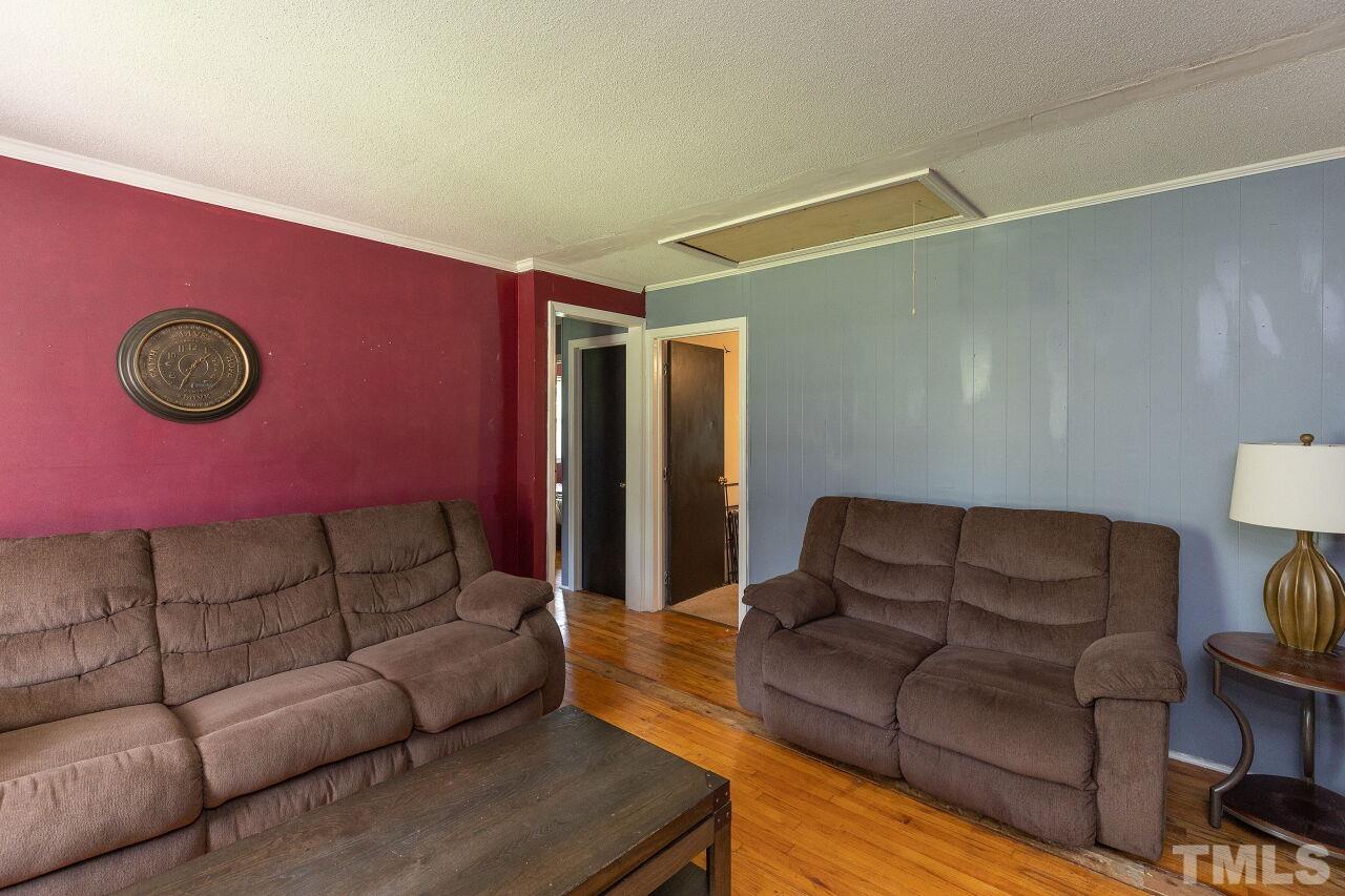 680 Haywood Bailey Road Roxboro, NC 27574 - Photo 5 of 29 a living room with furniture