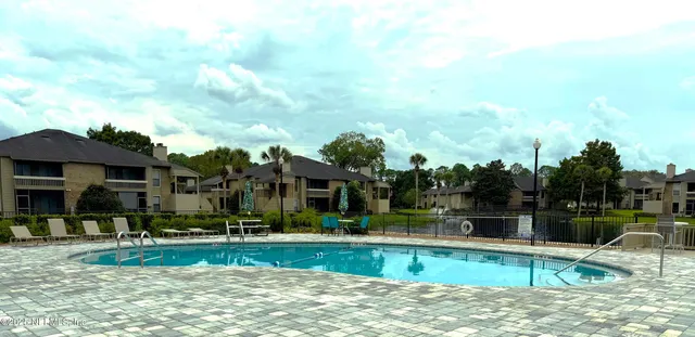 a view of a house with a swimming pool