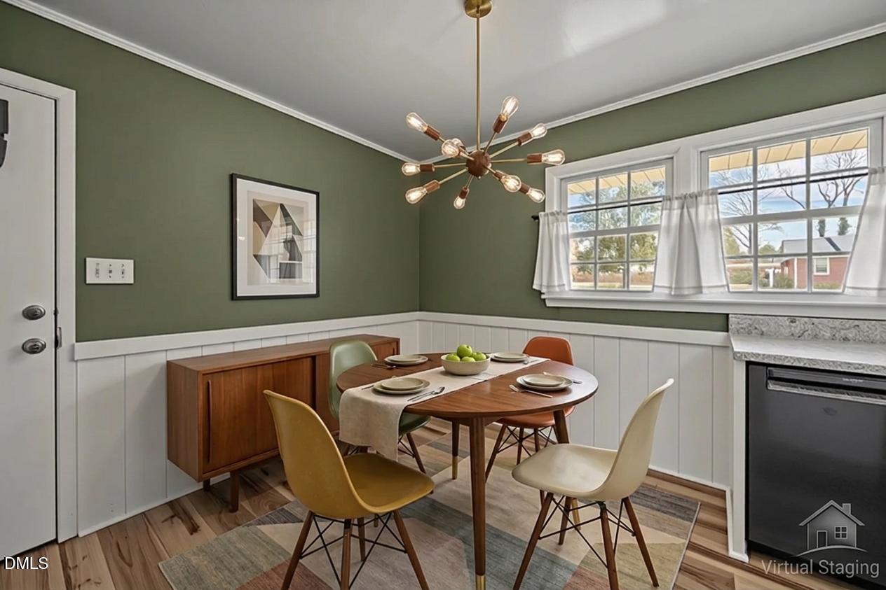 3521 Huntleigh Drive Raleigh, NC 27604 - Photo 7 of 56 a dining room with furniture and window