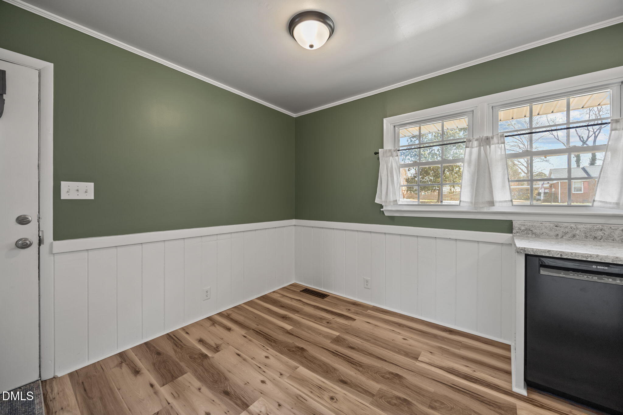 3521 Huntleigh Drive Raleigh, NC 27604 - Photo 9 of 56 a view of empty room with wooden floor and fan