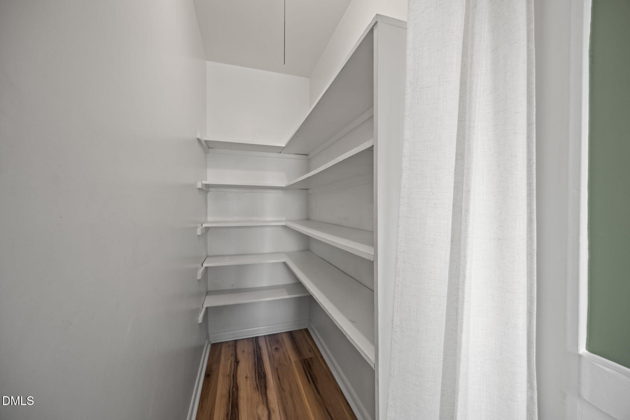 3521 Huntleigh Drive Raleigh, NC 27604 - Photo 11 of 56 a view of staircase with white walls and a window