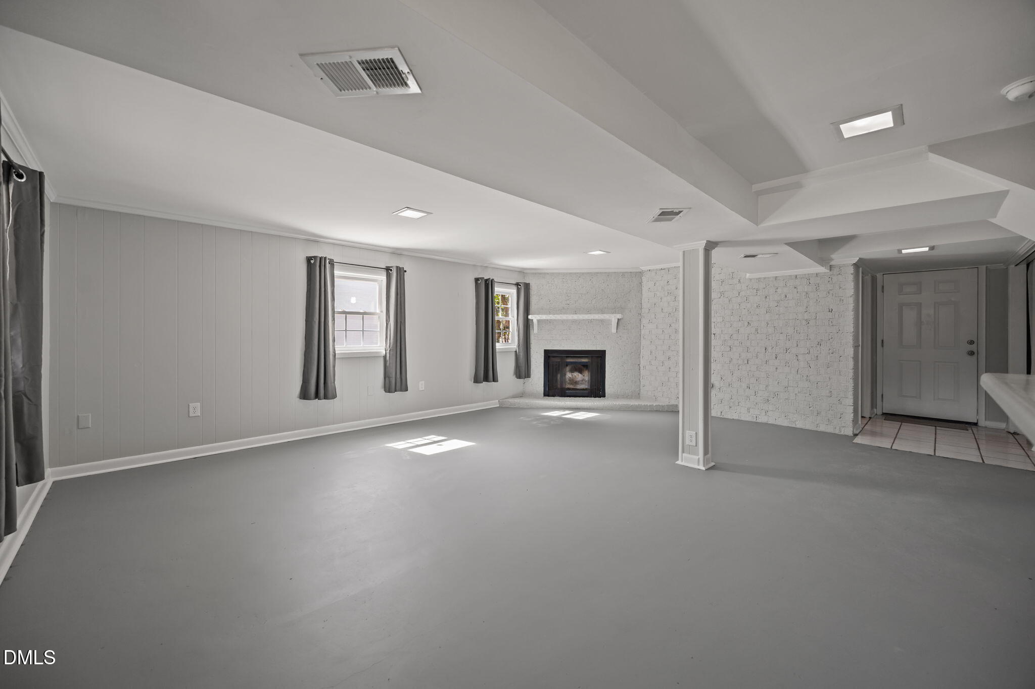 3521 Huntleigh Drive Raleigh, NC 27604 - Photo 28 of 56 a view of empty room with a fireplace