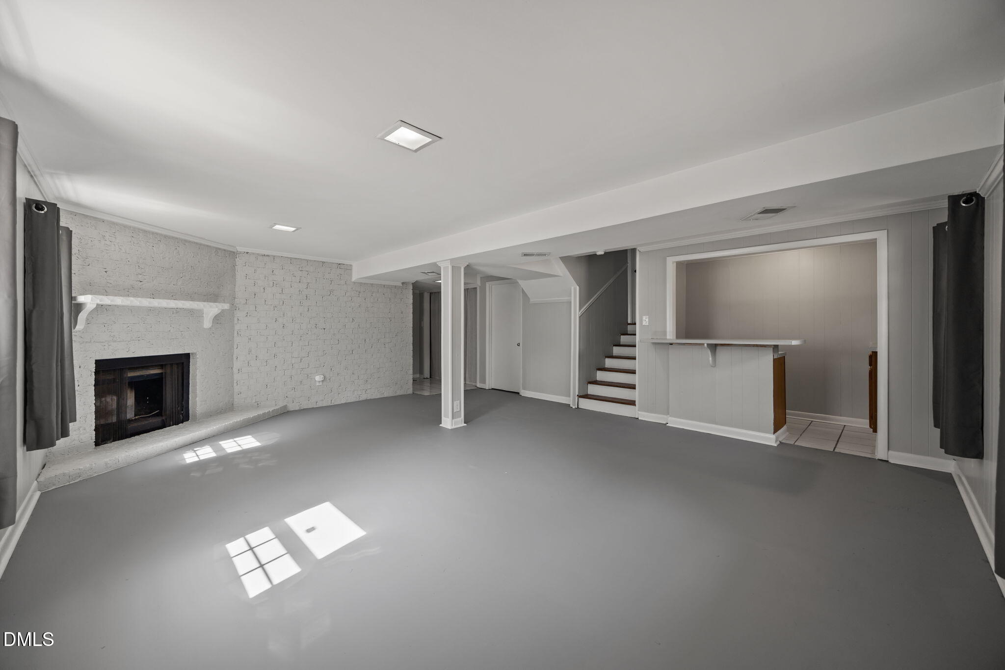 3521 Huntleigh Drive Raleigh, NC 27604 - Photo 29 of 56 a view of a livingroom with a fireplace and window