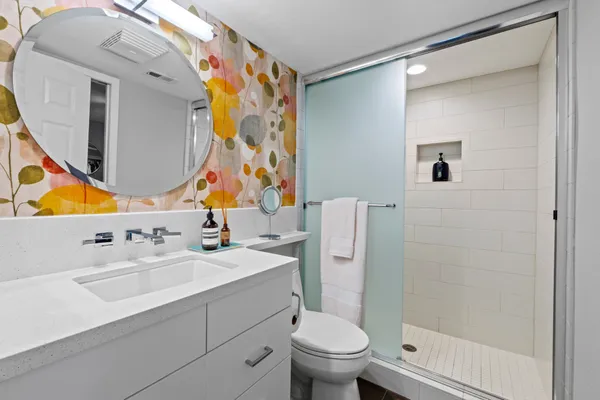 a bathroom with a sink and a mirror