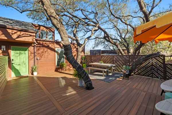 a view of outdoor space with deck and patio
