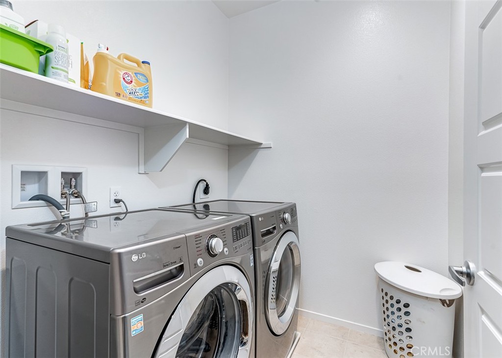 5756 Spring Street Buena Park, CA 90621 - Photo 12 of 16 a utility room with dryer and washer