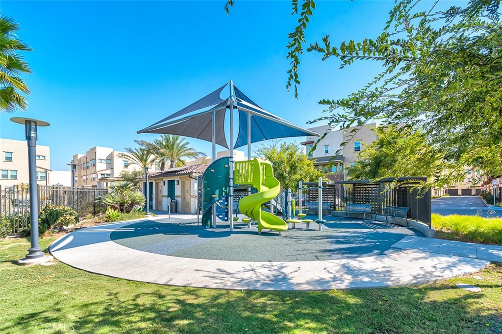 5756 Spring Street Buena Park, CA 90621 - Photo 14 of 16 a view of outdoor space with playground and green space