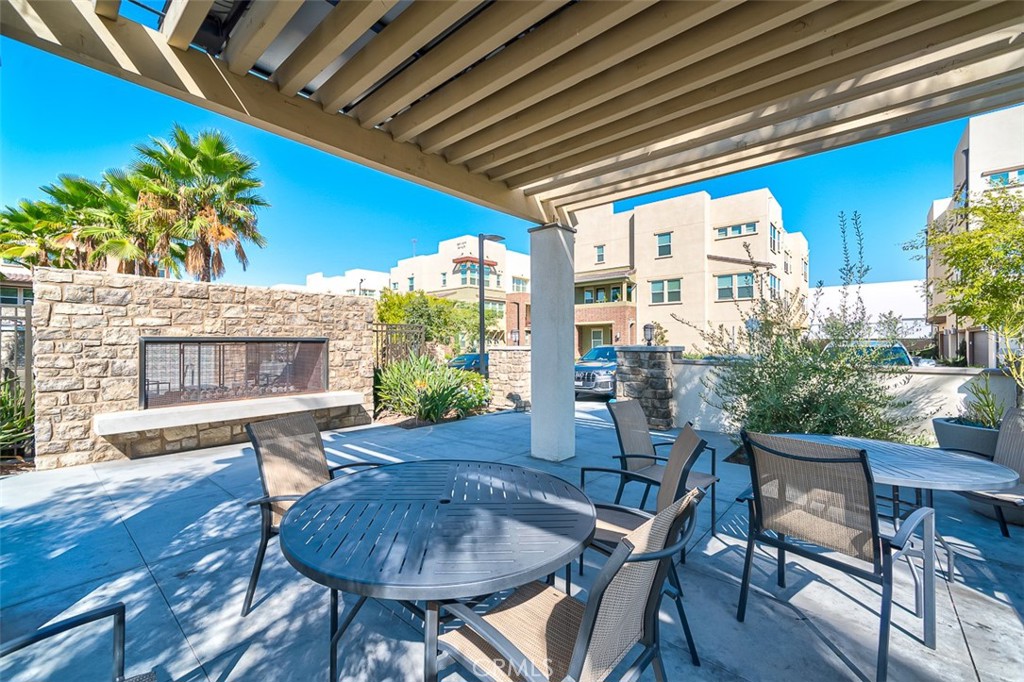 5756 Spring Street Buena Park, CA 90621 - Photo 15 of 16 a view of a porch with furniture and a table
