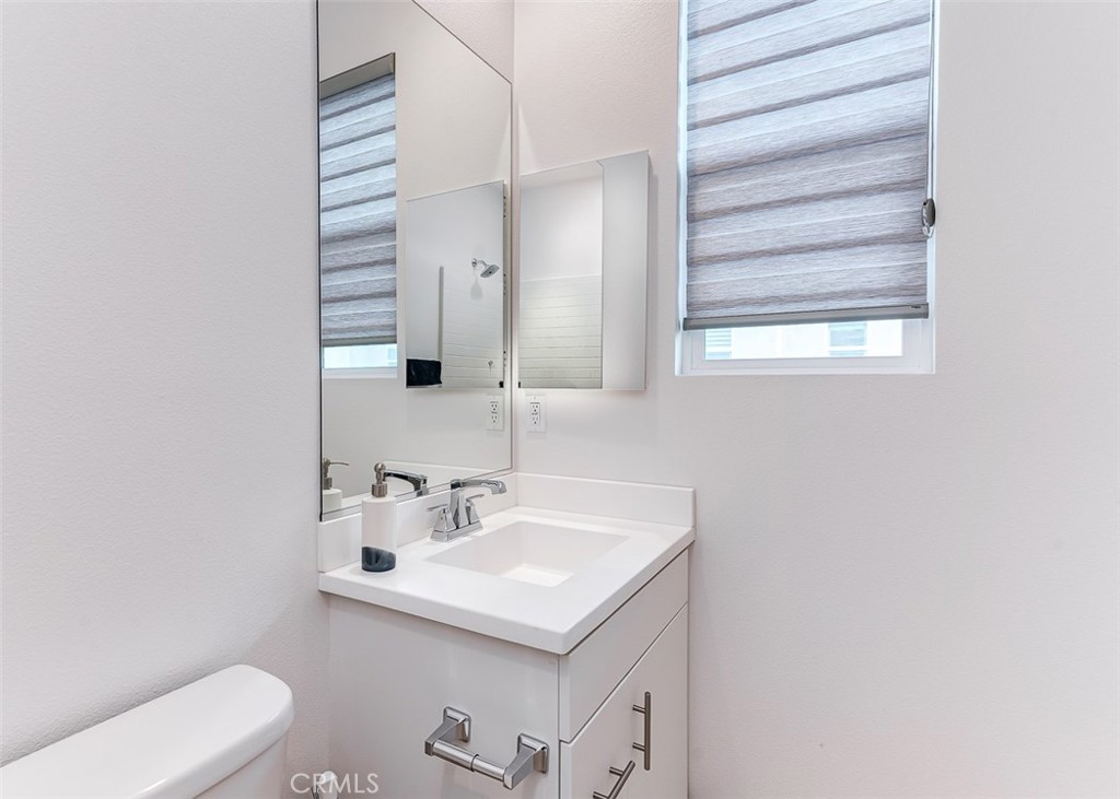 5756 Spring Street Buena Park, CA 90621 - Photo 9 of 16 a bathroom with a sink and a toilet