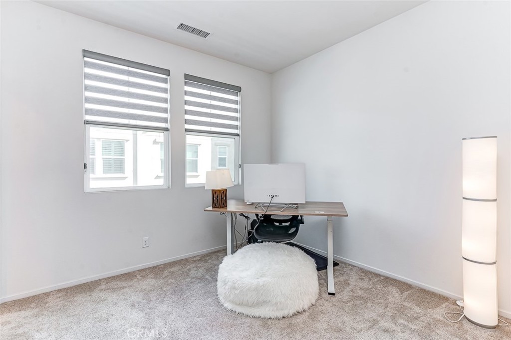 5756 Spring Street Buena Park, CA 90621 - Photo 10 of 16 a room with a window and a table