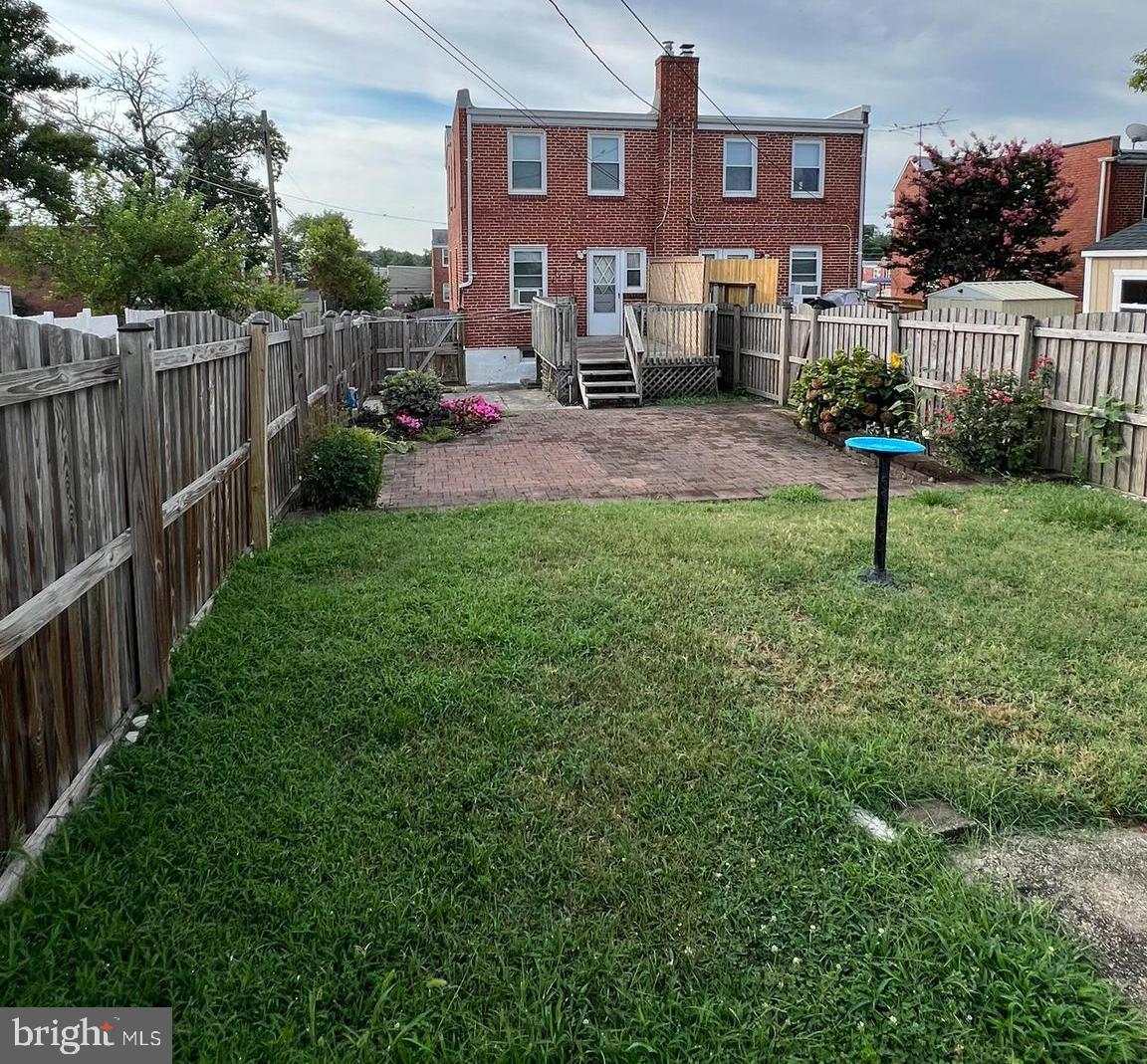 3500 Greenvale Road Baltimore, MD 21229 - Photo 18 of 18 Fenced in yard with deck.