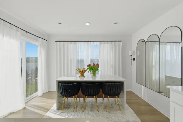 a spacious bedroom with a bed and a window