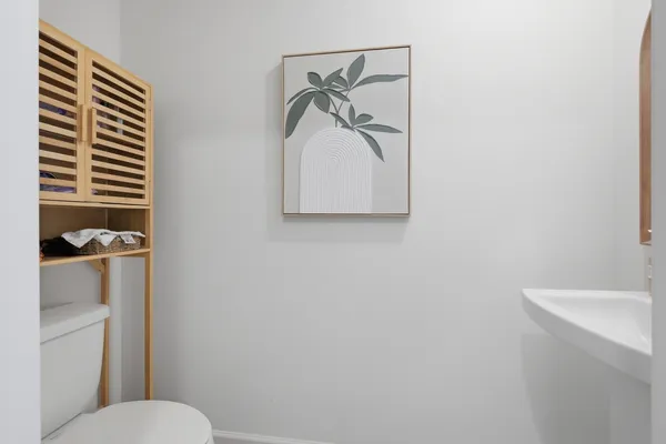 a bathroom with a double vanity sink and mirror