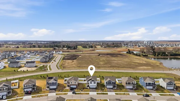 a aerial view of a house with a garden