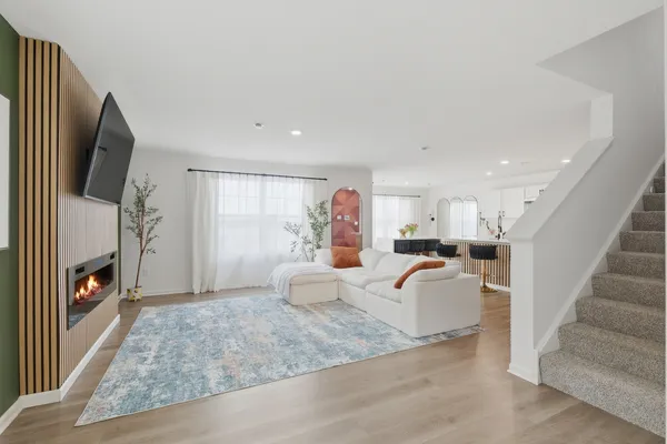 a living room with furniture and a couch