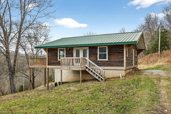a view of a yard with an outdoor space